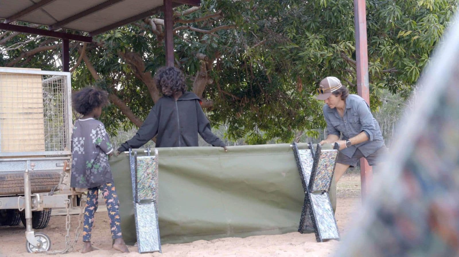 Alice Springs — bed beside trailer