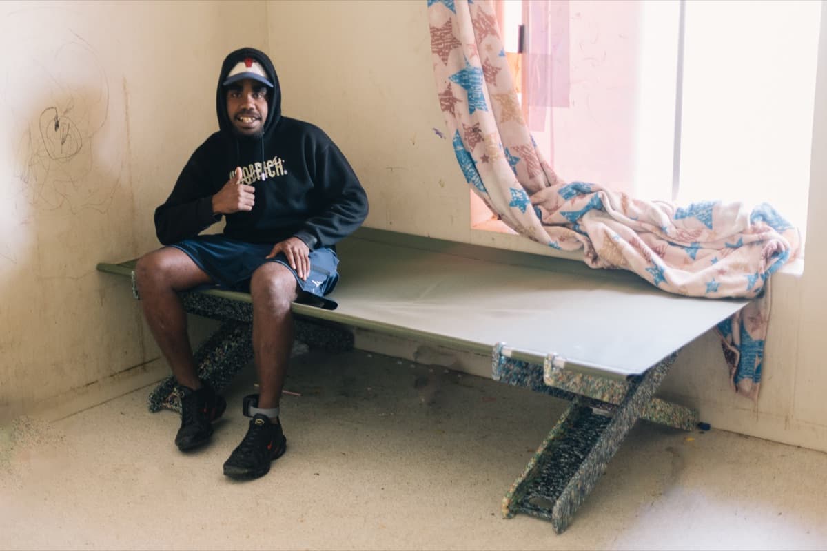Mykel with the Stretch Bed he helped make