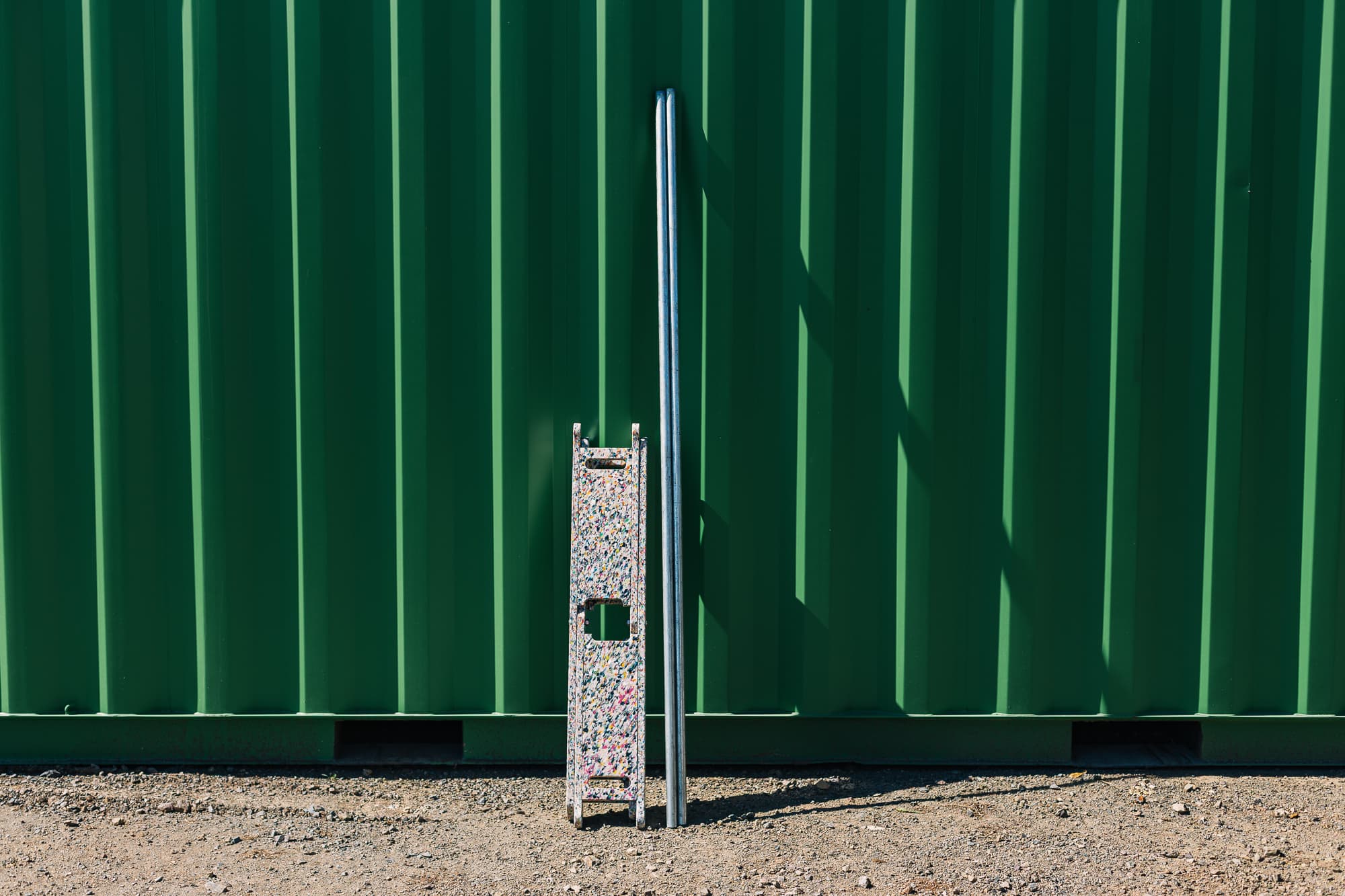 First pole threads through canvas sleeve