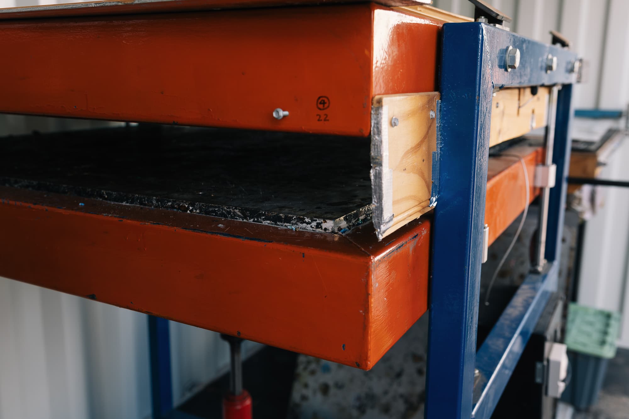 Heat press inside the production container