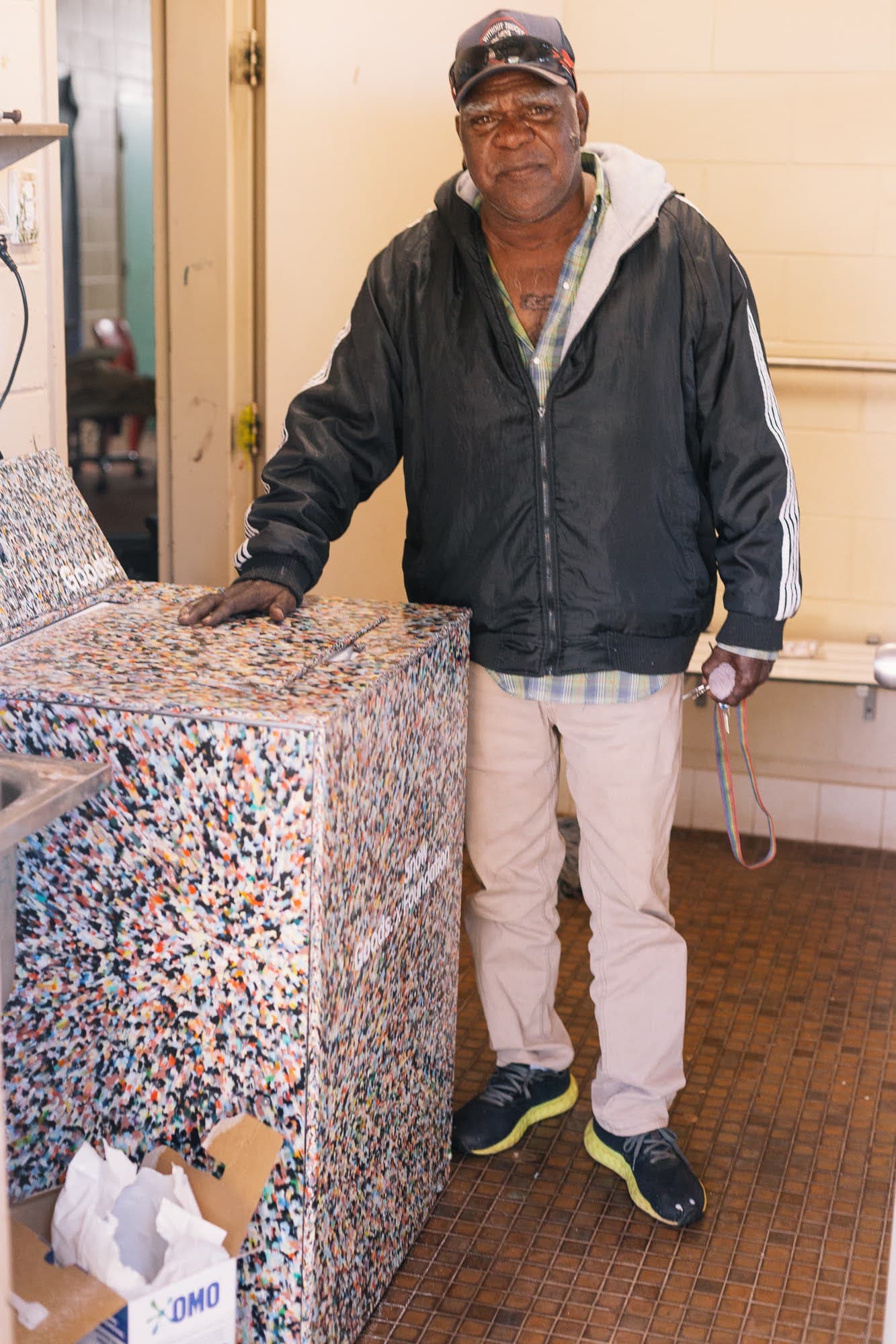 Community members with the Pakkimjalki Kari washing machine